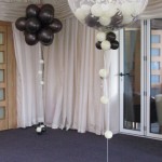 Calderfields- Three corners of the room were decorated with large Topiary Balls, the fourth corner hosted the cake table. Either side of the dance floor were 2 of our 'Studley Bubbles' filled with small balloons and confetti.Decor by Huff, Puff and Away!