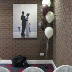 Calderfields- Another 'Happy Couple' in the form of a Jack Vettriano print. The ceremony room was simply and stylishly decorated with 5-balloon Clusters. Decor by Huff, Puff and Away!