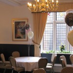 Hillscourt Conference Centre. 3-balloon Clusters in the stunning combination of pearl ivory, pearl pink and chocolate inside a 'Just Married Around' clear balloon.