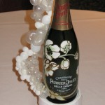 One of the unique table centrepieces, a champagne bottle hiding an indoor firework. Each table had one, wired to set off remotely and all at the same time!