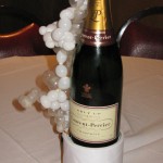One of the unique table centrepieces, a champagne bottle hiding an indoor firework. Each table had one, wired to set off remotely and all at the same time!