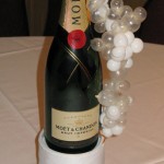 One of the unique table centrepieces, a champagne bottle hiding an indoor firework. Each table had one, wired to set off remotely and all at the same time!
