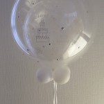 This 24" Bubble makes a very subtle but sophisticated statement. The inner double-stuffed balloon is a printed clear 16" latex balloon, keeping everything very transparent. The outer plastic Bubble has chrome studs, applied by hand, to make a very individual piece. This 24" Bubble makes a very subtle but sophisticated statement. The inner double-stuffed balloon is a printed clear 16" latex balloon, keeping everything very transparent. The outer plastic Bubble has chrome studs, applied by hand, to make a very individual piece.