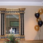 5-balloon Clusters in gold and black, the gold balloons being printed with 2 different designs. The Queen Hotel, Chester, balloon decor by Huff, Puff and Away! 5-balloon Clusters in gold and black, the gold balloons being printed with 2 different designs. The Queen Hotel, Chester, balloon decor by Huff, Puff and Away!