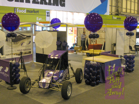 Giant balloons on dressed armatures, on the Sandwell College stand at the NEC Skills Show